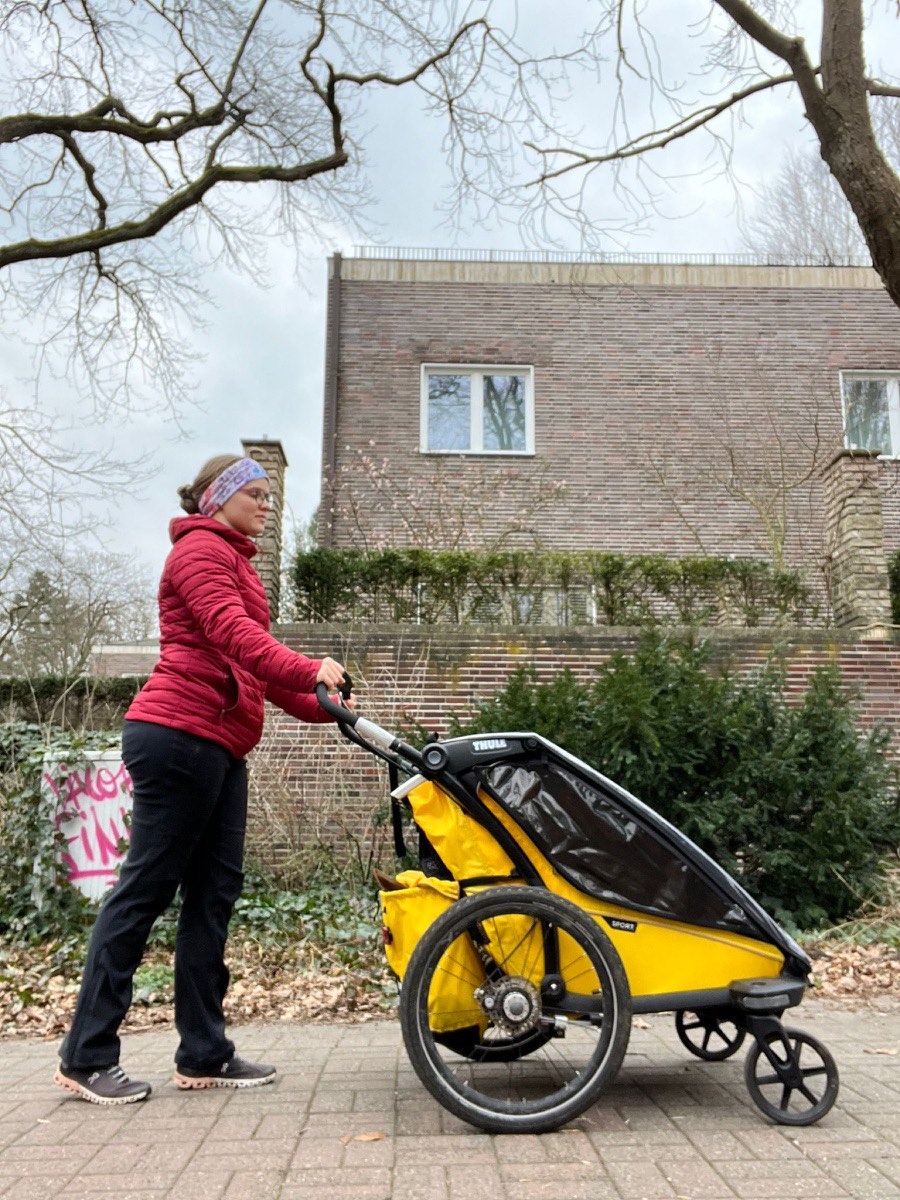 Carolin jogging while pushing a twin stroller